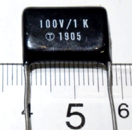 1uF/100V  T